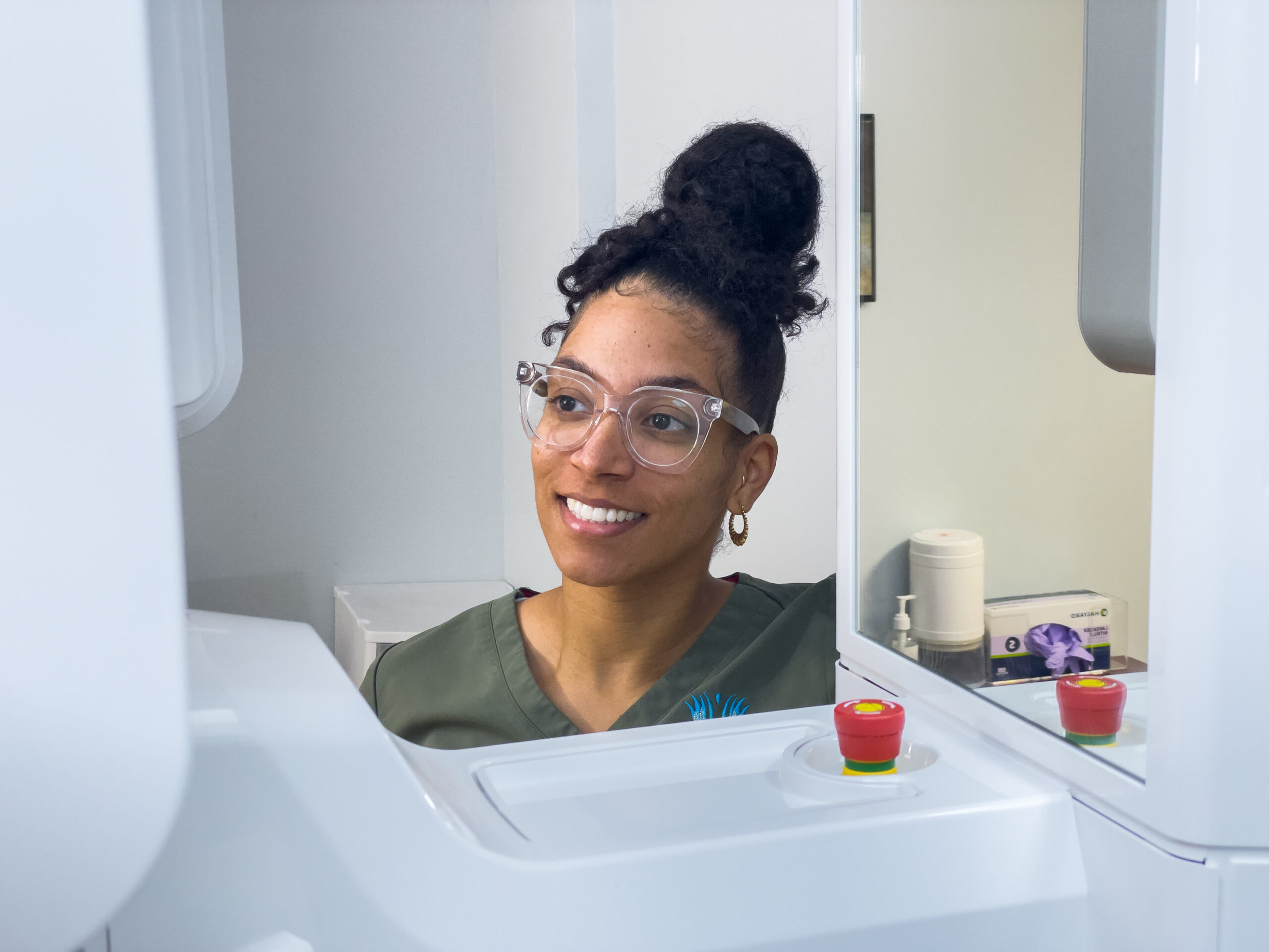 Smiling patient in the treatment chair at ReNew Dental